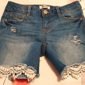 Girls distressed shorts